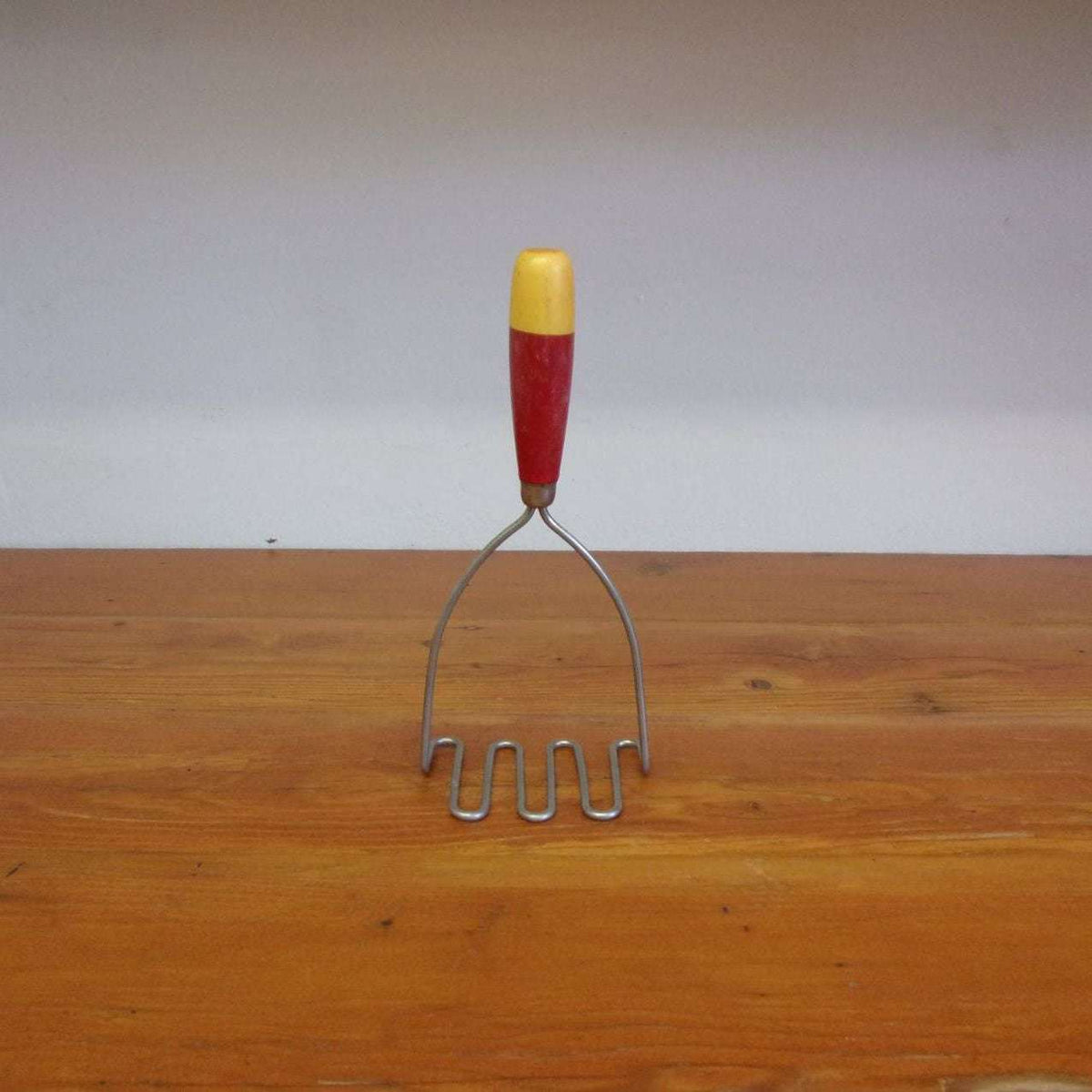 http://maandpasattic.com/cdn/shop/files/antique-vintage-potato-masher-with-red-with-white-handle-kitchen-tools-gadgets-ma-and-pas-attic-32293013_1200x1200.jpg?v=1683068940