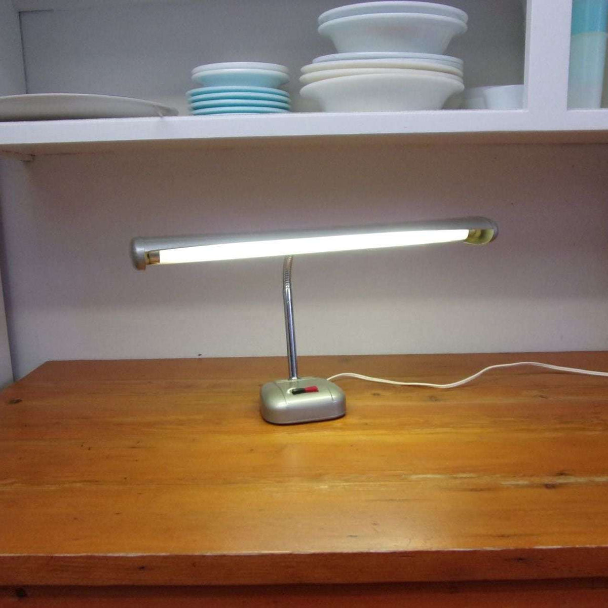 Fluorescent reading lamp top