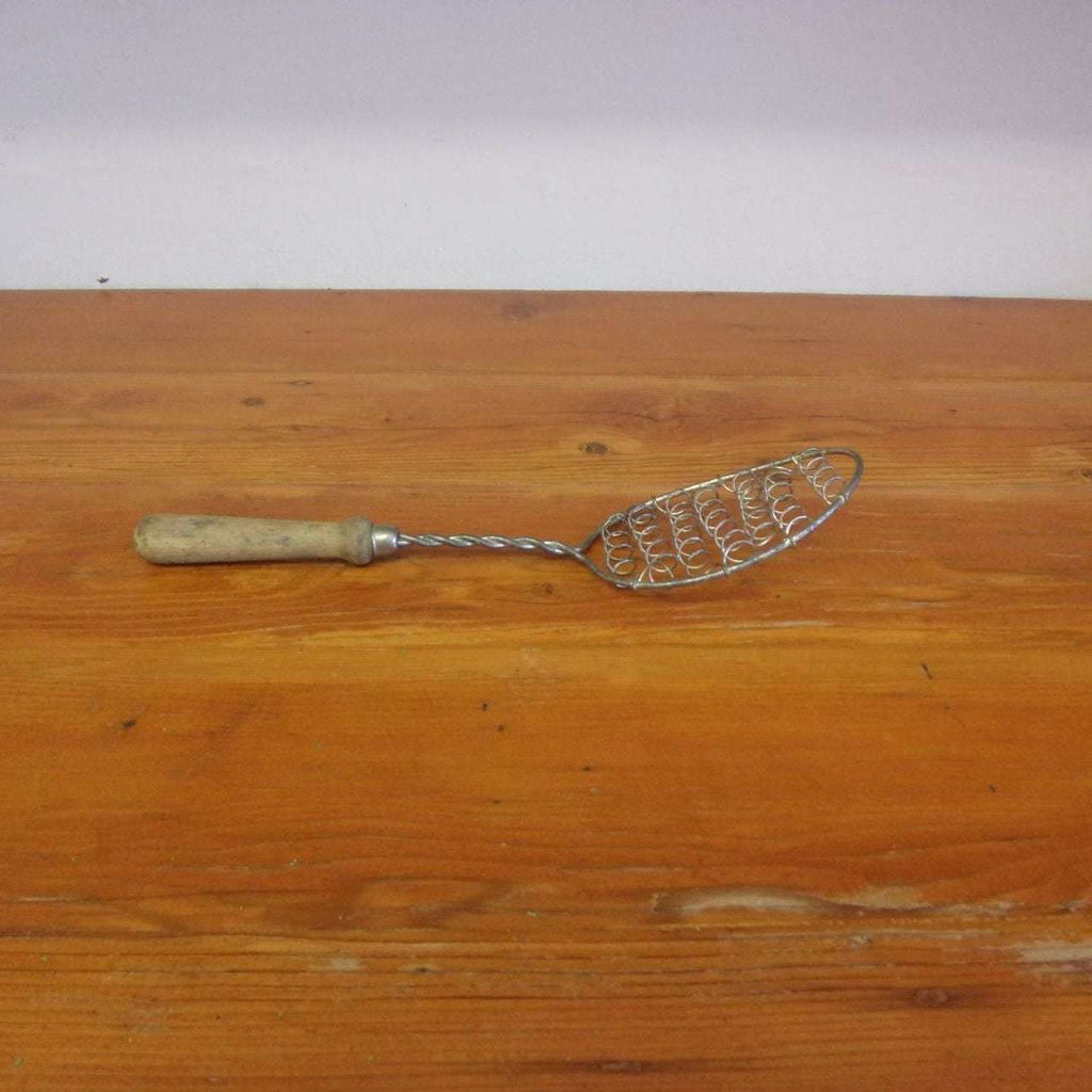 https://maandpasattic.com/cdn/shop/files/antique-wire-whisk-egg-beater-coil-head-with-wood-handle-kitchen-tools-gadgets-ma-and-pas-attic-32293031_1024x1024.jpg?v=1683070477