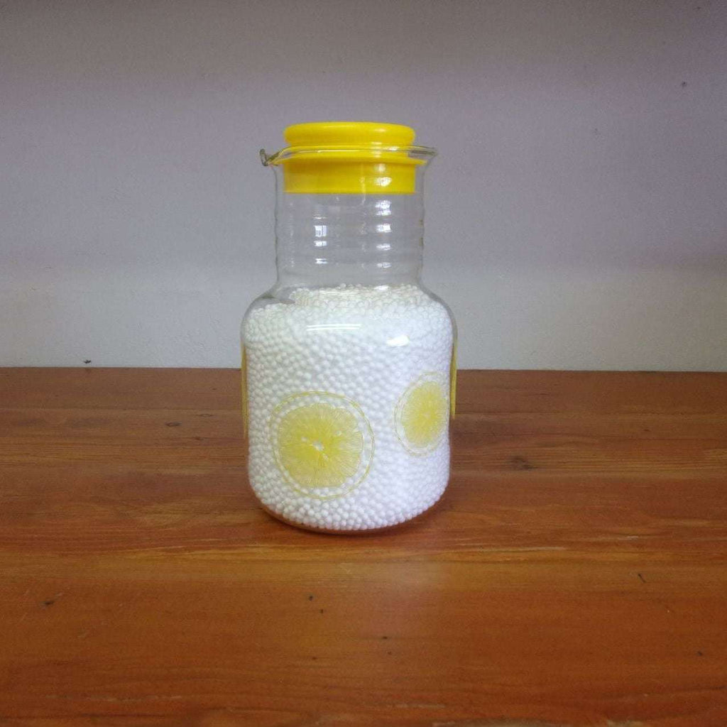 https://maandpasattic.com/cdn/shop/products/vintage-pyrex-juice-carafe-with-lemon-print-vintage-pyrex-yellow-pyrex-ma-and-pas-attic-31382099_1024x1024.jpg?v=1660771883
