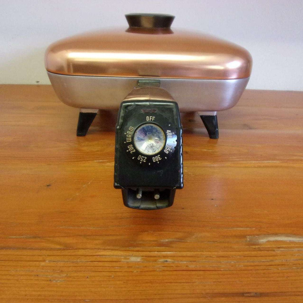 https://maandpasattic.com/cdn/shop/products/vintage-westinghouse-electric-frying-pan-with-copper-lid-retro-kitchen-appliances-fryer-cooker-ma-and-pas-attic-31959649_1024x1024.jpg?v=1676060041