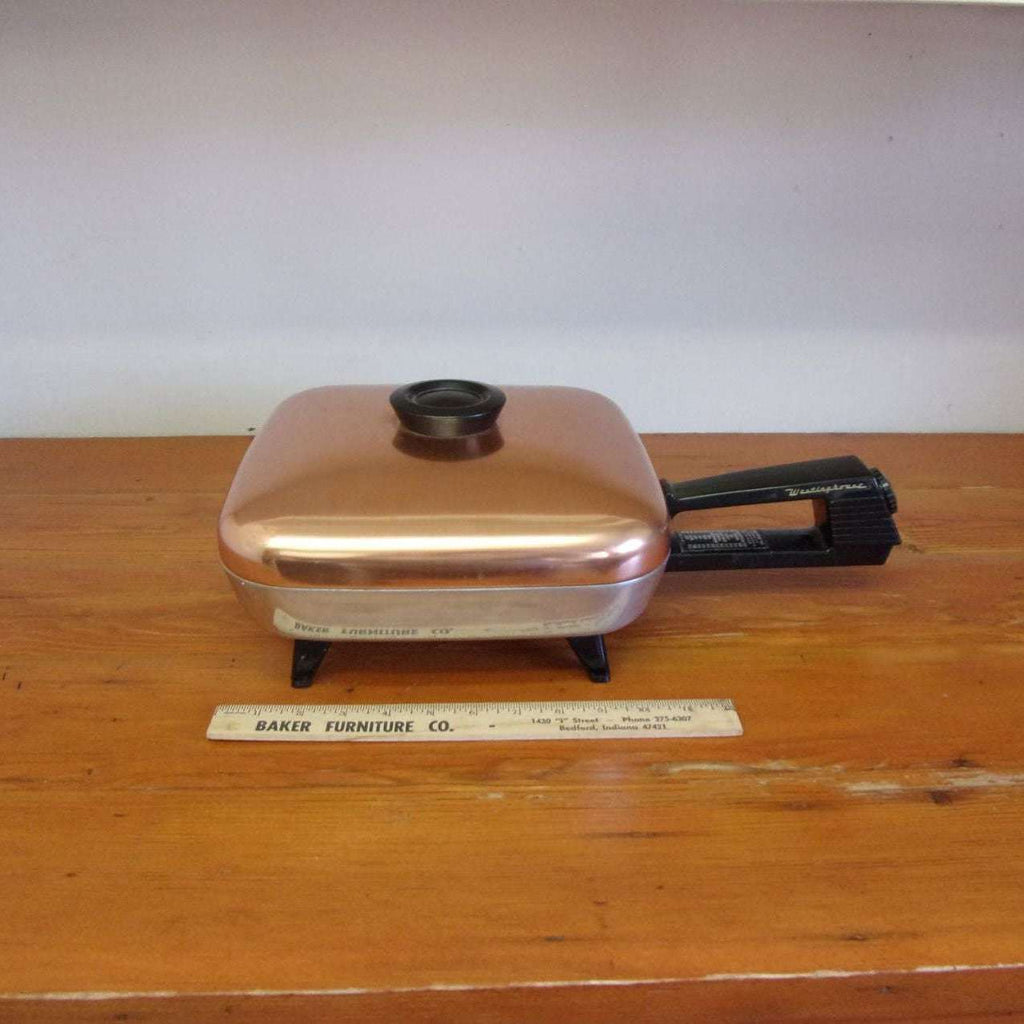 https://maandpasattic.com/cdn/shop/products/vintage-westinghouse-electric-frying-pan-with-copper-lid-retro-kitchen-appliances-fryer-cooker-ma-and-pas-attic-31959653_1024x1024.jpg?v=1676060048